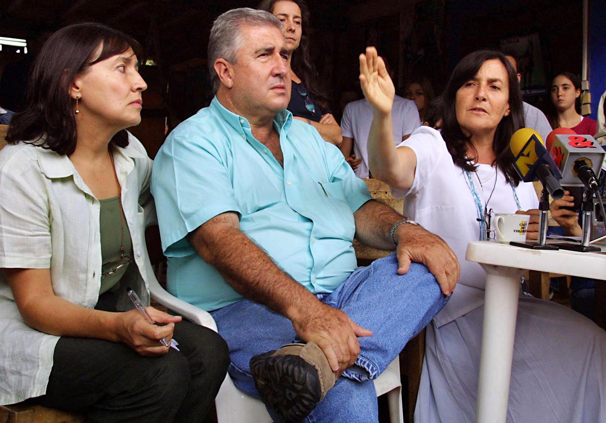 Maria Isabel (L), Juan David (C) and Martha Nieves Ochoa