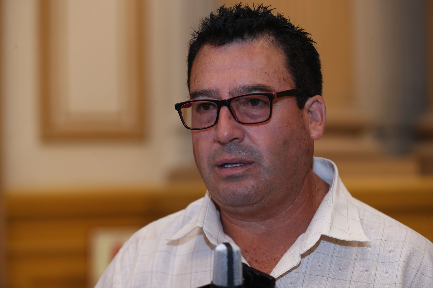 Martínez.