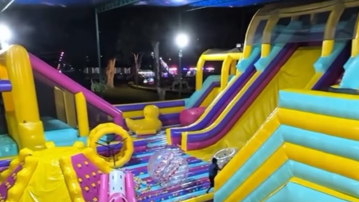 Clausuran juego inflable en el Circuito Mágico del Agua tras grave accidente de una menor